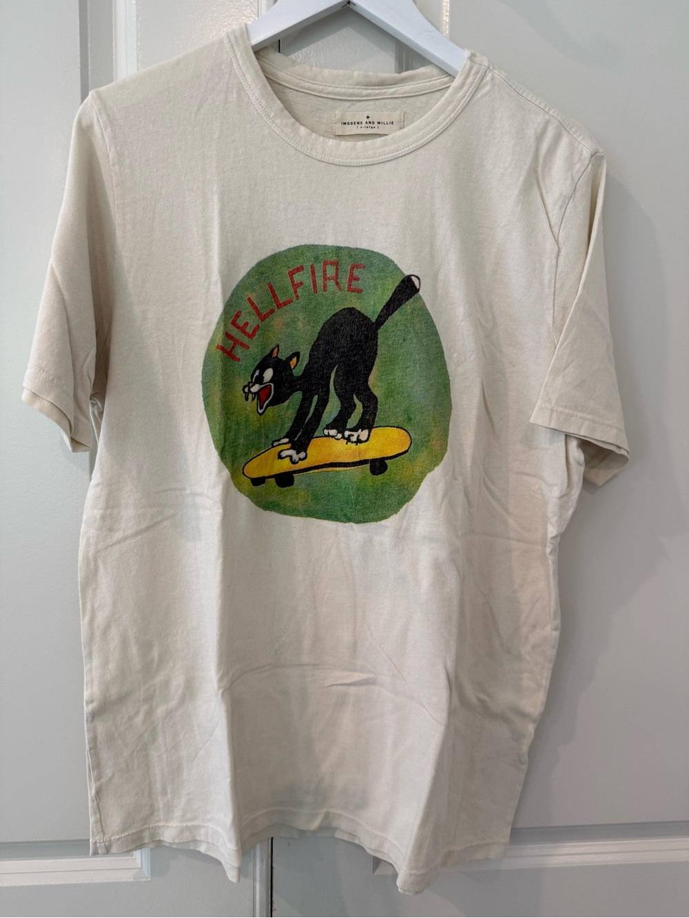 imogene + willie Cream Hellfire Tee with Black Cat on Skateboard